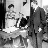 Abigail Scott Duniway signs Oregon's Equal Suffrage Proclamation in a ceremony on Nov. 30, 1912,
