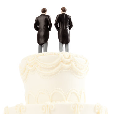 Two grooms on a cake