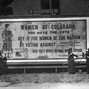 Suffragists With Anti-Woodrow Wilson Billboard, 1916